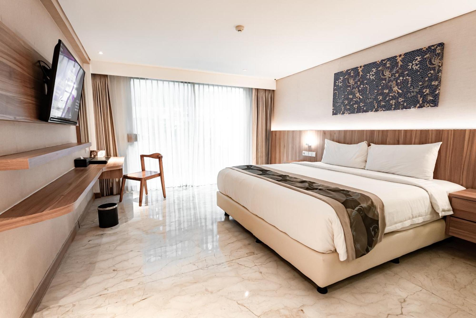 Chambre Deluxe Double ou Lits Jumeaux