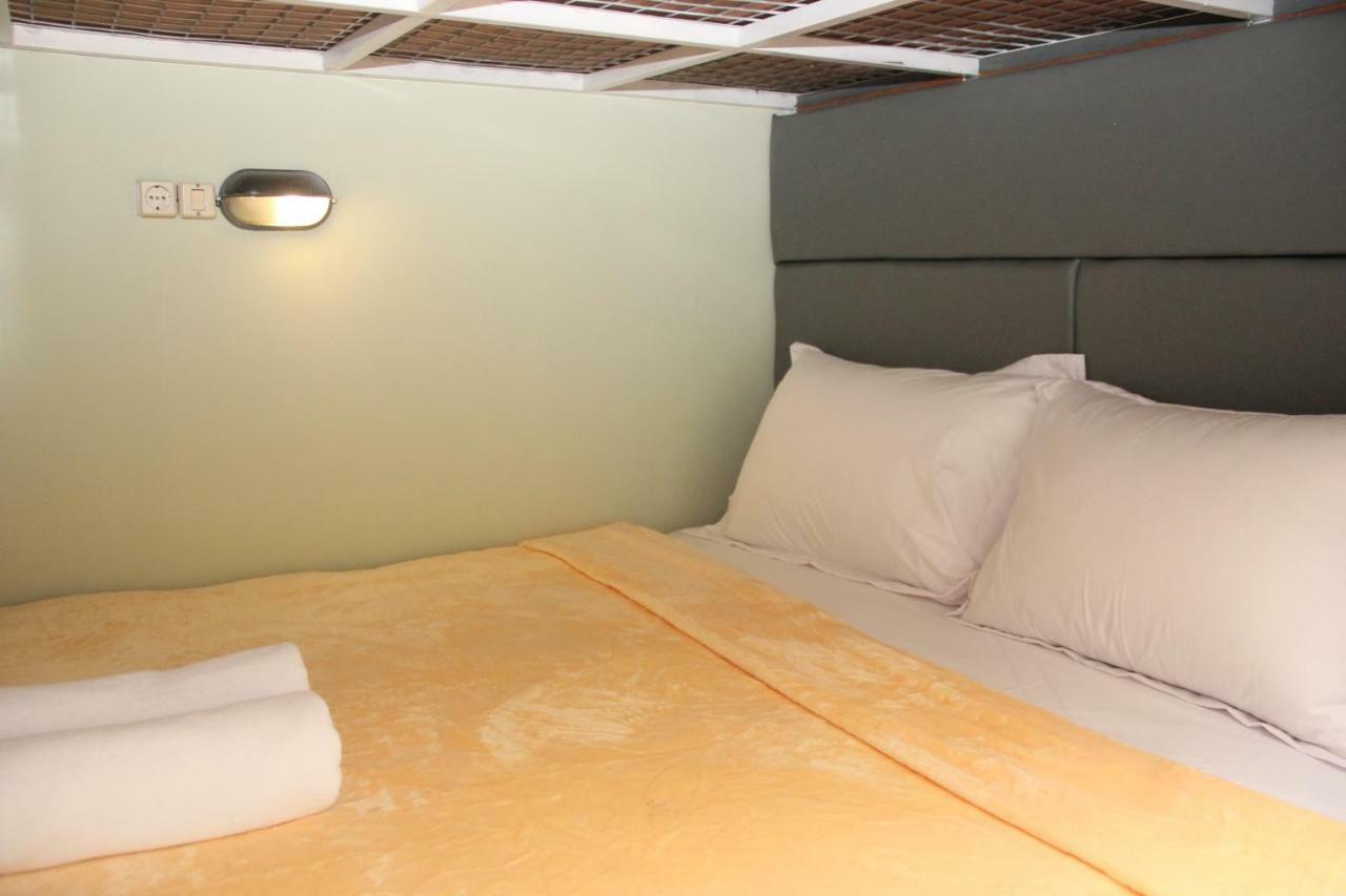 Cama en habitación compartida mixta de 4 camas